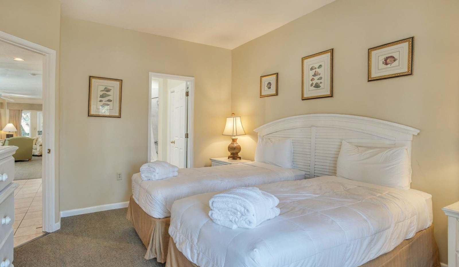 The second bedroom, with two queen beds